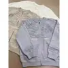 Cárdigan de punto de cachemira retro estilo americano con cuello redondo, corte casual y holgado, adecuado tanto para hombres como para mujeres, perfecto para el invierno