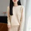 Listo para usar de primera línea 100% lana otoño/invierno 2026 nuevo suéter de punto pullover liso de cuello redondo de corte holgado para mujer
