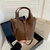 Colección de otoño 2026 nueva para mujer Ruien: un bolso bandolera elegante y casual con un acabado texturizado, que ofrece una gran capacidad y un look moderno