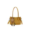 Bolsa pequena quadrada popular de estilo coreano para mulheres deste ano, novidade do Outono de 2026, cor sólida, simples, bolsa de ombro único, para o trabalho, bolsa transversal