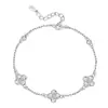 Pulsera de trébol de cuatro hojas de plata de ley S925 para mujer, lujo ligero, nicho, sensación de alta gama, microincrustada con flores de diamante, joyería hecha a mano, fabricantes, venta al por mayor