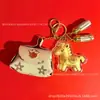 Venta al por mayor de Llavero Popular Shuibei Oro Puro 999 Nube y Caballo Colgante de Bolsa Plana Impreso Adorno de Regalo Exquisito