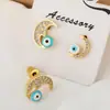 Pendientes de distrito Lu estilo INS lindos geométricos ojos de luna azul pendientes de personalidad de nicho pendientes nuevos para mujer suministro transfronterizo
