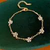 Pulseira Borboleta Flor em Ouro Real 14K Galvanizado com Zircônia, Pulseira de Luxo Leve Nicho High-End, Acessório de Mão Elegante e Versátil