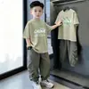 Camiseta Infantil 100% Algodão 2026 Nova Verão Estilosa Manga Curta Fina para Crianças Pequenas Roupas de Verão
