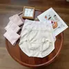 8605 Panties de Nylon sin Costuras de Cintura Alta con Sensación de Piel Nude para Mujer, Panties Lisos Casuales Estilo Japonés de Color Sólido para Mujer al por Mayor