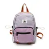 Mochilas de estilo coreano de moda con bloques de color para estudiantes de jardín de infantes y escuela primaria para niños y niñas, mochila ligera para viajes infantiles