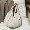 Estilo Coreano Estilo Ins Design de Nicho Fashionável Texturizada Bolsa de Ombro para Mulheres 2026 Novo Modelo Bolsa de Mão Bolsa de Ombro Simples