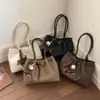 Bolso de Mano Casual con Personalidad de Moda, Diseño de Nicho, Bolso Texturizado, Nuevo Bolso de Hombro de Moda para Mujer Primavera 2026