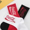 Nuevos calcetines altos de letras ins Cola estilo coreano personalizados medias hip hop marca de moda callejera europea y americana calcetines para parejas hombres y mujeres