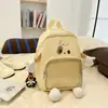 Mochila nueva y linda de dibujos animados para mujer, mochila transparente de moda con bloques de color, bolsa ligera versátil para exteriores y escuela casual