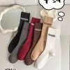 Calcetines de cachemira gruesos y cálidos con diseño simple de invierno, calcetines de tubo retro japoneses Joker con letra X pequeña para mujer, venta al por mayor