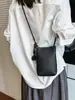 Bolso cruzado de cuero suave de alta gama a la moda para teléfono móvil, Bolso cuadrado pequeño versátil simple y elegante, Bolso cubo de alta gama con bola tejida
