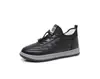 Nuevo estilo transfronterizo 2026, diseño minimalista, parte superior de cuero de alta calidad, botas de invierno con hebilla y cierre elástico, zapatos de algodón para hombre con forro grueso y afelpado