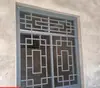 Ventana de red antirrobo reja de hierro forjado aleación de aluminio ventana antigua china reja antirrobo calle rural pantalla divisoria de balcón