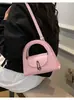 Bolsa de mão de nicho transfronteiriça feminina nova bolsa de ombro única meia-lua versátil para o dia a dia fecho de metal retrô bolsa transversal bolsa da moda