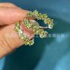 Anillo de plata de ley 925 con olivina natural de alta calidad al por mayor de fábrica para decoración