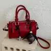 Bolsa de Mão Retrô Feminina 2026 Nova Verão Popular Moda Bolsa de Ombro para o Trabalho Crossbody Boston Bolsa Almofada