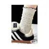Calcetines largos a rayas y de lunares, modernos, dulces y lindos, para estudiantes, estilo coreano, perfectos para otoño e invierno, con etiqueta de tela y longitud hasta la mitad de la pantorrilla.