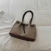 Bolso de mano grande y moderno para el día a día, nuevo y moderno para principios de otoño de 2026, bolso de hombro de color liso de alto valor para el trabajo