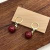 Pendientes de perlas negras de alta calidad para mujer, elegantes pendientes retro de lujo ligeros de moda de Corea del Sur, pendientes con diseño de nicho.