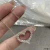 Collar de cruz en tamaños grande y pequeño, completamente incrustado de diamantes, diseño clásico, lujo ligero, versátil para capas diarias, regalo de alta gama para parejas