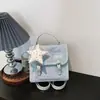 Mochila de mujer con estampado de estrellas transfronteriza 2026 nueva moda moderna bolso de mano versátil mochila mini para estudiante de viaje