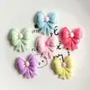 Brillante Lindo Lazo DIY Pegamento de Crema Parche de Resina Hecho a Mano Pasador Accesorio para el Cabello Colgante Mayoreo