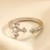 Anel Cruz Flor de Íris Inspirado em Design Transfronteiriço Flor de Cruz de Zircônia Vintage para Homens, Anel Ajustável de Luxo Leve Estilo Ins de Nicho de Alta Qualidade