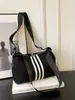 Nueva Bolsa de Estudiante de Nylon de Aspecto Elevado Estilo Coreano Moderna Bolso Tote Portátil Gran Capacidad Bolso de Hombro Cruzado Único Japonés para Mujeres