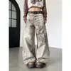 Nuevos jeans de pierna ancha estilo americano para otoño/invierno con estampado de leopardo degradado retro, que cuentan con múltiples filas de botones, un corte holgado y un diseño fluido y casual.
