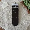 Calcetines de altura media con estampado floral y lazo de burbuja estilo coreano Peiqiao, dulces y femeninos, calcetines sin costuras de algodón puro, venta al por mayor de la industria del calcetín de Zhuji