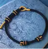 Año de nacimiento DIY cuerda de mano tejida a mano productos semiacabados pulsera de cuerda roja para parejas colgante de cuentas doradas de la suerte vestible