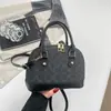 Moda Transfronteiriça 2026 Outono Nova Bolsa de Mão Estilosa Versátil Bolsa Concha Feminina Estampada Design de Nicho Bolsa de Ombro Único Transversal