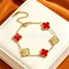 Pulseira de aço titânio trevo de quatro folhas da sorte para mulheres, cor dourada, dupla face, um item popular transfronteiriço, com design de madrepérola, e um estilo novo, moderno e versátil para os mercados europeu e americano