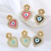 Pendientes europeos y americanos de venta caliente, frescos y lindos en forma de corazón para los ojos, exagerados para mujer, de aleación con aceite goteado, diamantes, perlas, lote de aretes