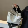 Bolsa Grande de Lona Listrada Feminina Nova Verão 2024 Bolsa de Ombro Cruzada Estilo Preguiçoso Bolsa Tote para o Dia a Dia