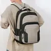 Mochila de negocios de comercio exterior al por mayor para hombres y mujeres, bolsa para computadora casual de gran capacidad, mochila de viaje para estudiantes elegante y simple
