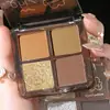 Placa de sombra de ojos de cuatro colores Ming Xizhi color tierra placa ahumada mate perlado brillante portátil placa de reparación para principiantes femenina transfronteriza