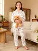 Traje de pijama para niños de comercio exterior otoño seda manga larga niñas ropa de casa de dos piezas ropa para niños una generación de cabello