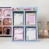 Novo produto criativo: Bloco de notas com prancheta da série Cartoon Hello Kitty com designs de personagens fofos, portátil e conveniente para os alunos usarem