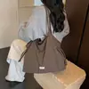 Bolsa de Ombro Grande Capacidade Estilo Coreano Transfronteiriça para Mulheres, Nova Coleção Outono/Inverno 2026, Design Casual Plissado, Bolsa Tote Estilosa com Alto Apelo Estético