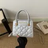 Bolso tipo Duchess de patrón de diamantes estilo Chanel pequeño para mujer 2026 nuevo de cuero genuino tacto de alta gama bolso de mano diseño de nicho bolso bandolera transfronterizo