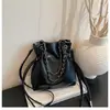 2026 Cor Sólida Elegante Primavera Nova Corrente Texturizada Moda Trabalho Casual Transversal Balde Bolsa para Mulheres