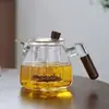 Tetera de vidrio tetera cocedor de té separación de té tetera de alta gama té negro estufa eléctrica de cerámica transparente mango de madera con tapa filtro