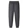 Pantalones de nieve gruesos para hombre con forro polar, para invierno, transfronterizos, talla grande, a prueba de viento, impermeables, cálidos, de algodón, para papás de mediana edad