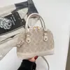 Moda Transfronteriza Otoño 2026 Nuevo Elegante Versátil Bolso de Mano Bolso Tipo Concha para Mujer Estampado Diseño de Nicho Bolso de Hombro Cruzado