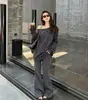Conjunto de dos piezas de estilo casual transfronterizo para primavera y otoño: sudadera lisa de manga larga con hombros descubiertos y pantalones anchos de pierna larga hasta el suelo