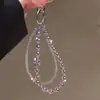 Colgante de Perla de Cristal Suave y Elegante Cadena para Teléfono Móvil Llavero de Nudo de Lazo Estrella de Cinco Puntas Cadena Doble Accesorios Modelo Nuevo 2026