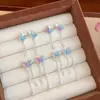 Brincos Femininos de Resina Pérola Borboleta com Franja Estilo Super Fada Coreana Agulha de Prata Doce Elegante Luxo Leve High-end All-match